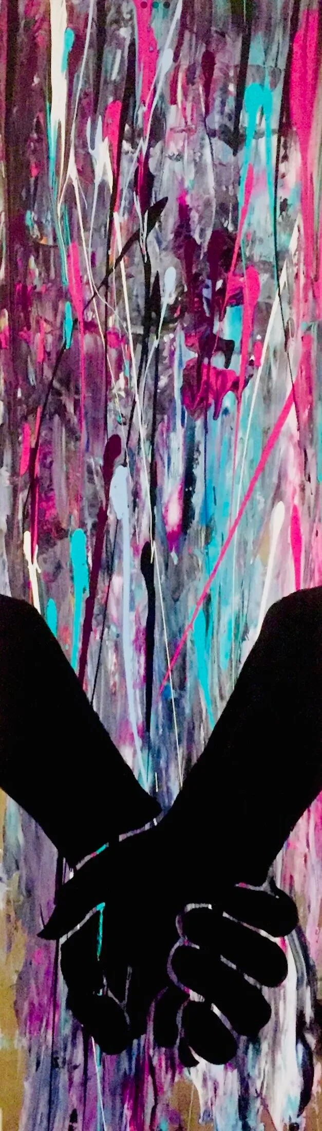 Abstract splatter painting with magenta, turquoise, gray and white paint drips and splatters. Two black silhouetted hands with interlocked fingers are clasped together in the lower portion of the canvas.